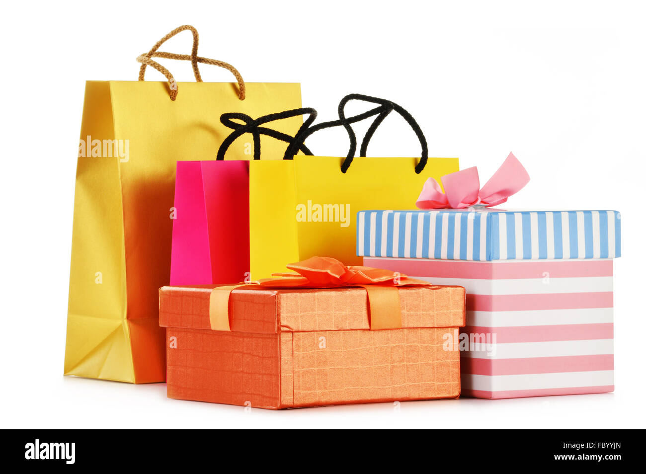 Gift boxes and colorful gift bags isolated on white background Stock