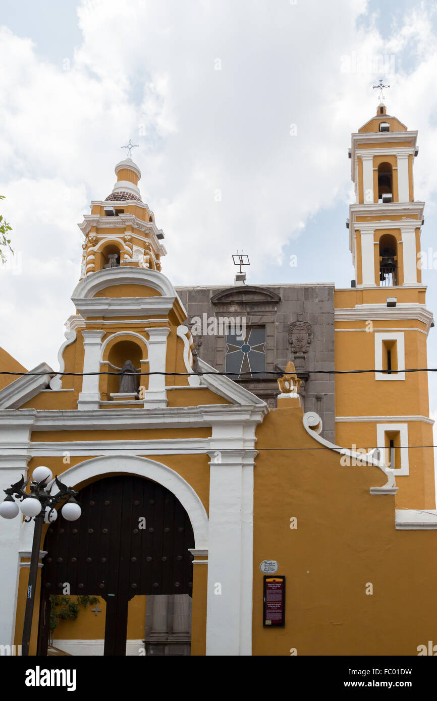 Exterior of Templo del Ex-Hospital de San Juan de Dios, a 17th century Roman Catholic Church in Puebla Mexico. Stock Photo
