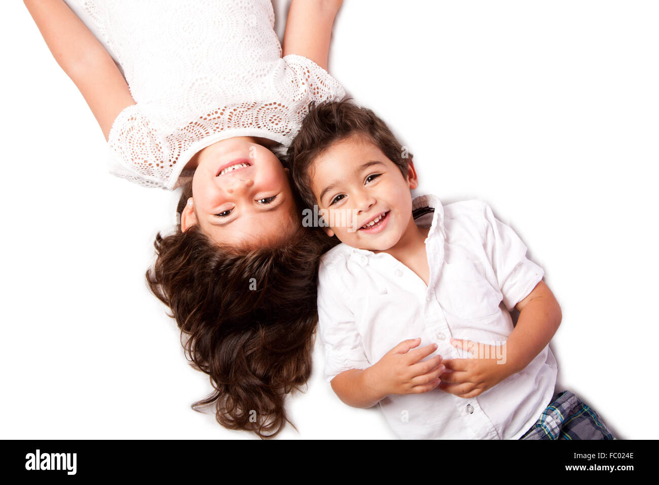 Family siblings laying together Stock Photo