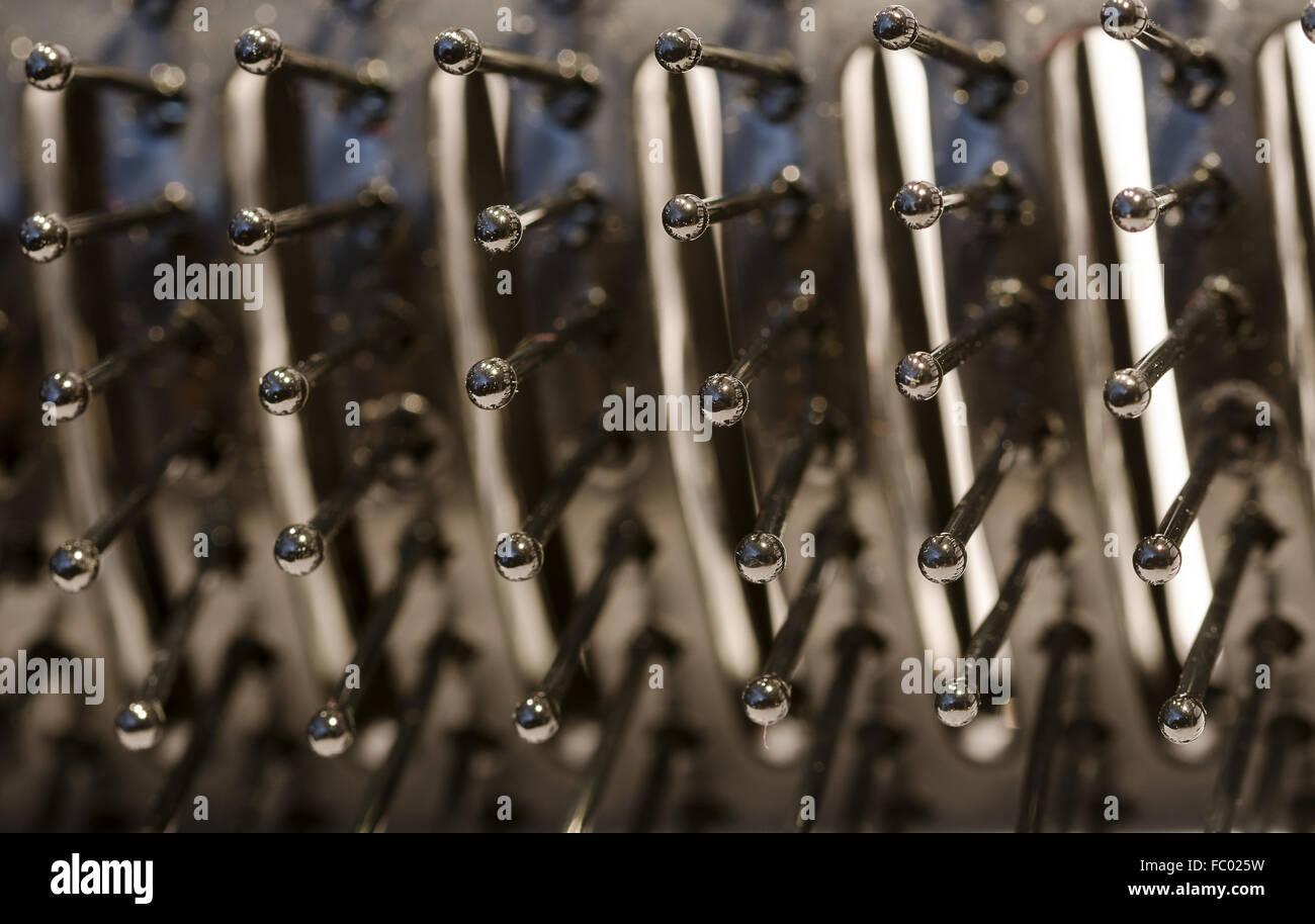 spikes of a black plastic hair brush Stock Photo