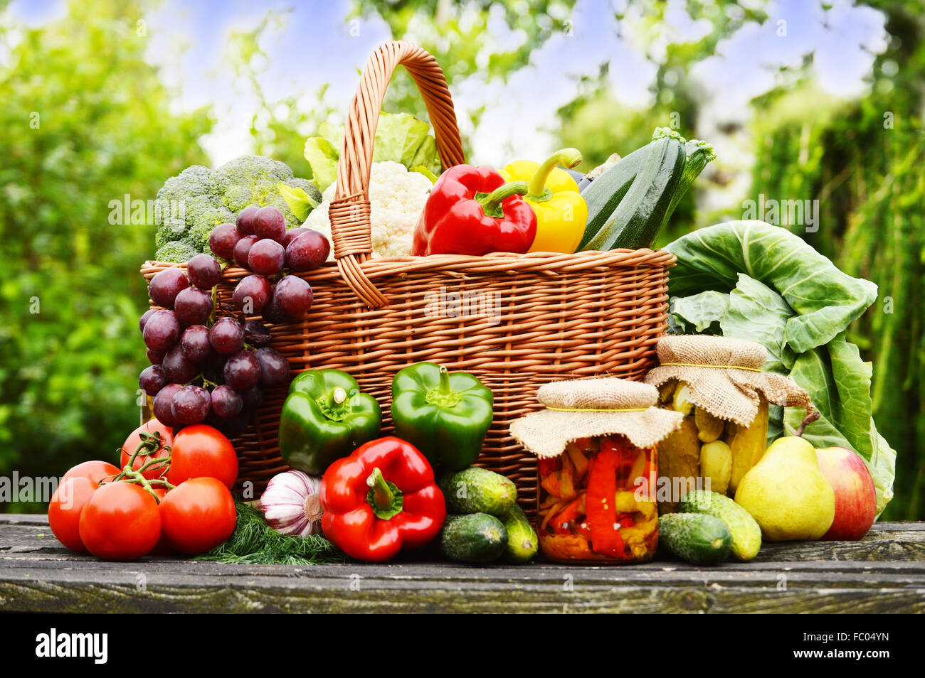 Fresh organic vegetables in wicker basket in the garden Stock Photo - Alamy
