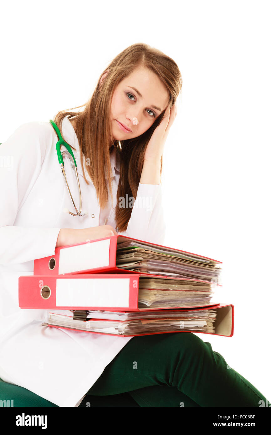 Paperwork. Overworked doctor woman with documents Stock Photo