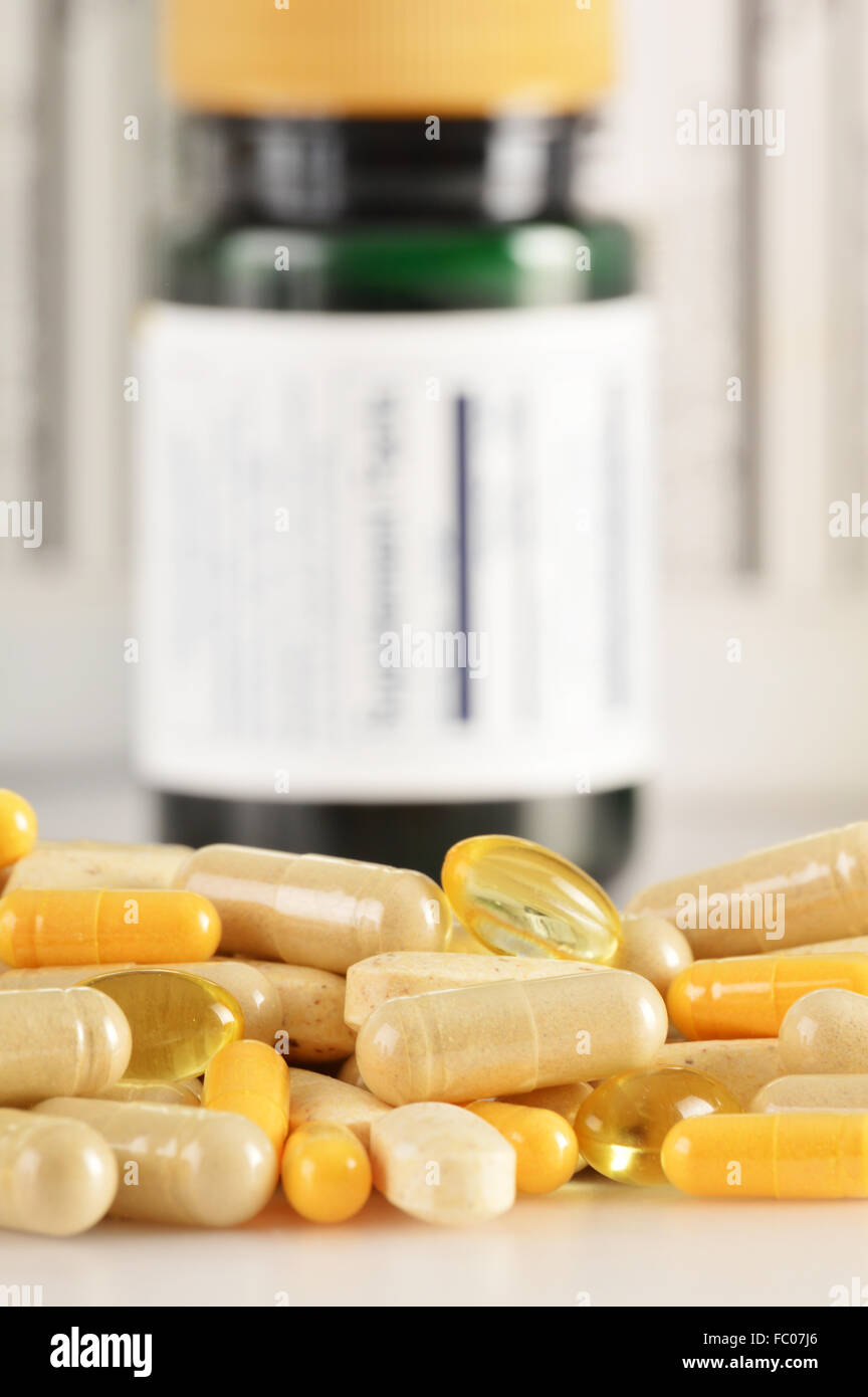Composition with dietary supplement capsules. Drug pills Stock Photo