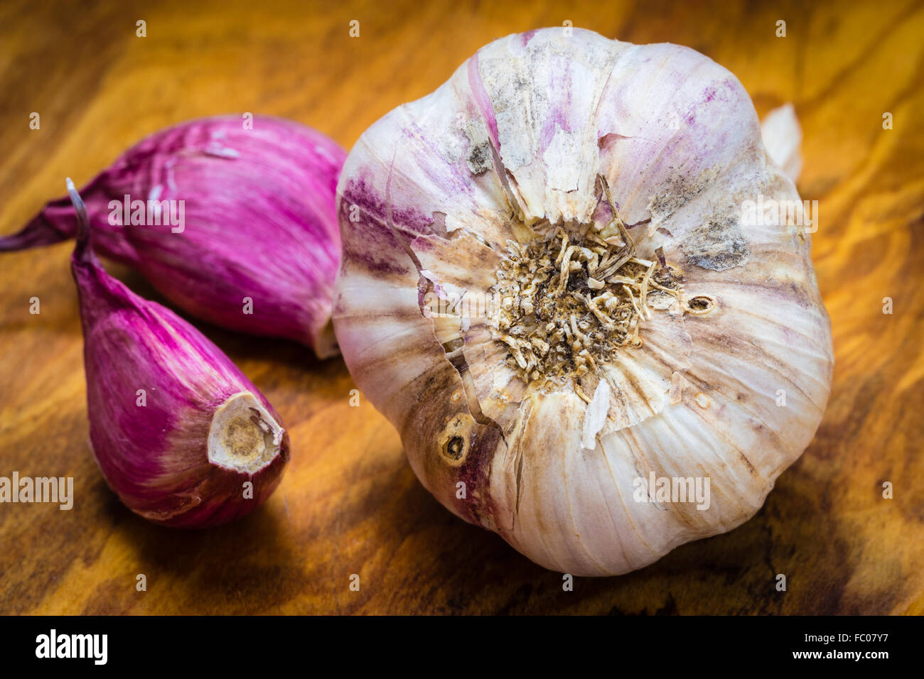 Organic garlic on wooden table background Stock Photo