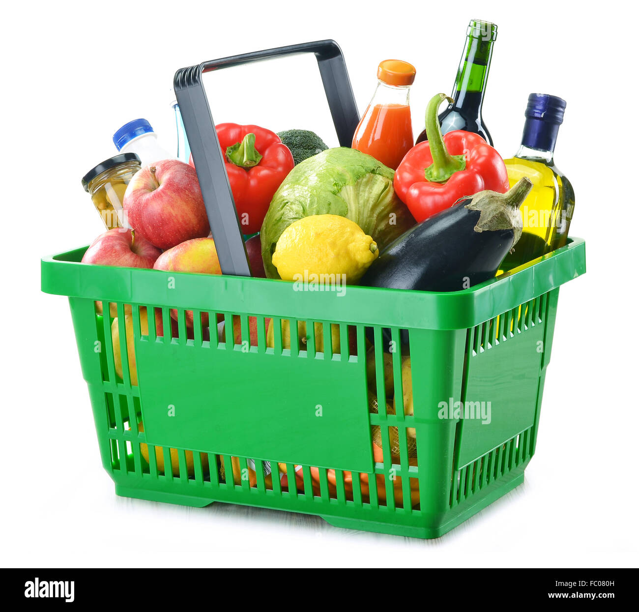 Green shopping basket with variety of grocery products including