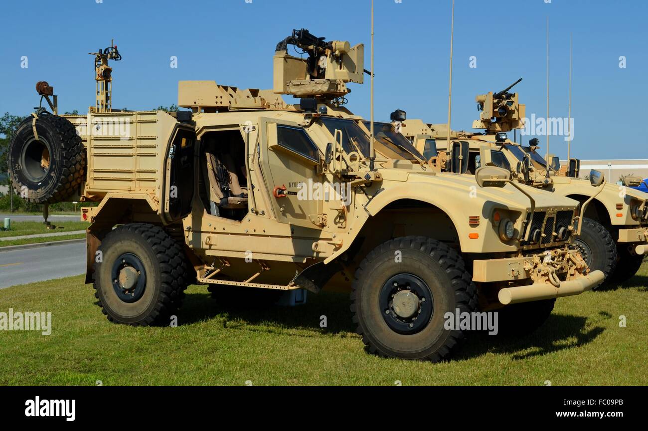 The Oshkosh Mine-Resistant Ambush Protected (MRAP) truck is used by the U.S. military for troop transportation. Stock Photo