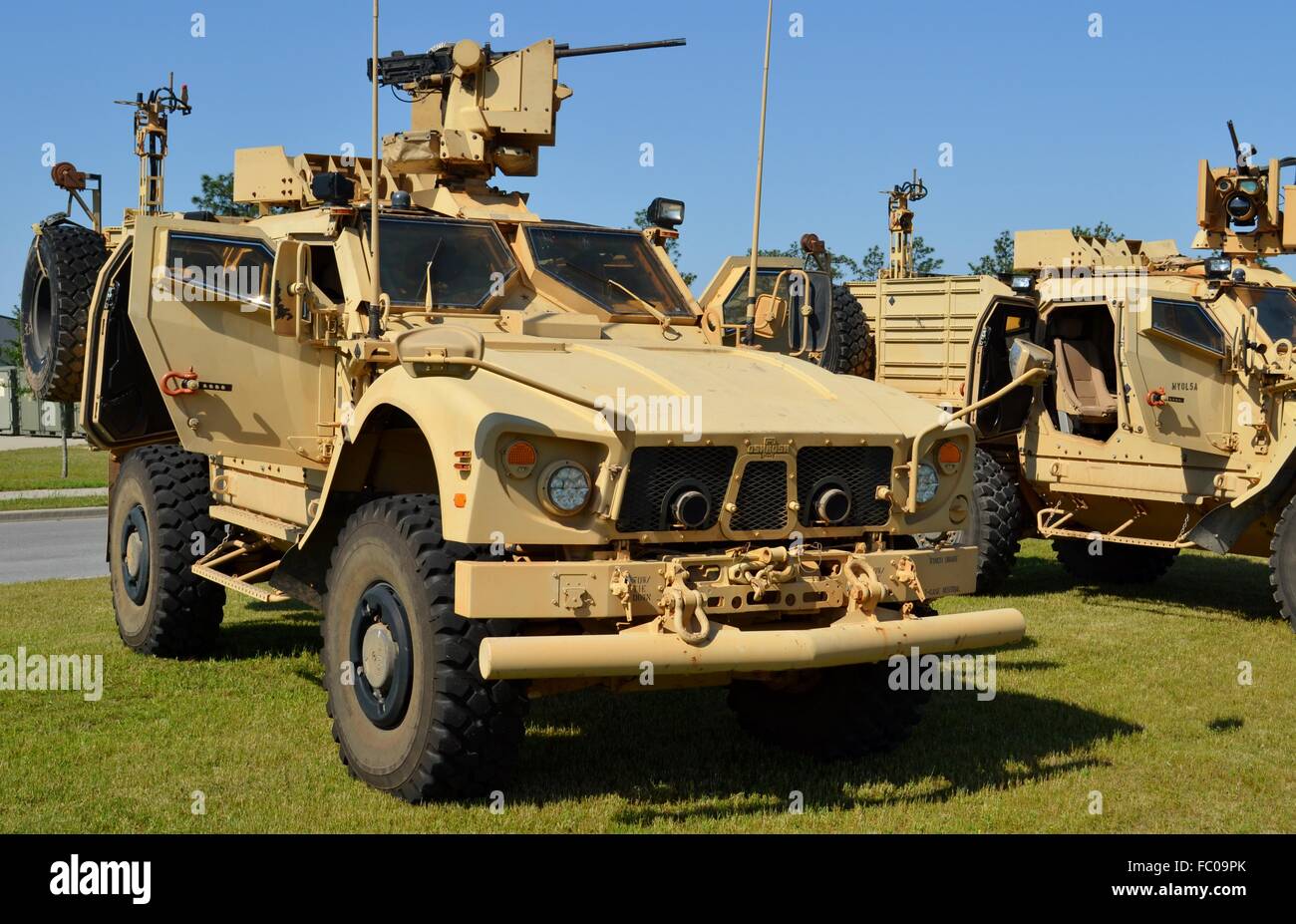 The Oshkosh Mine-Resistant Ambush Protected (MRAP) truck is used by the U.S. military for troop transportation. Stock Photo
