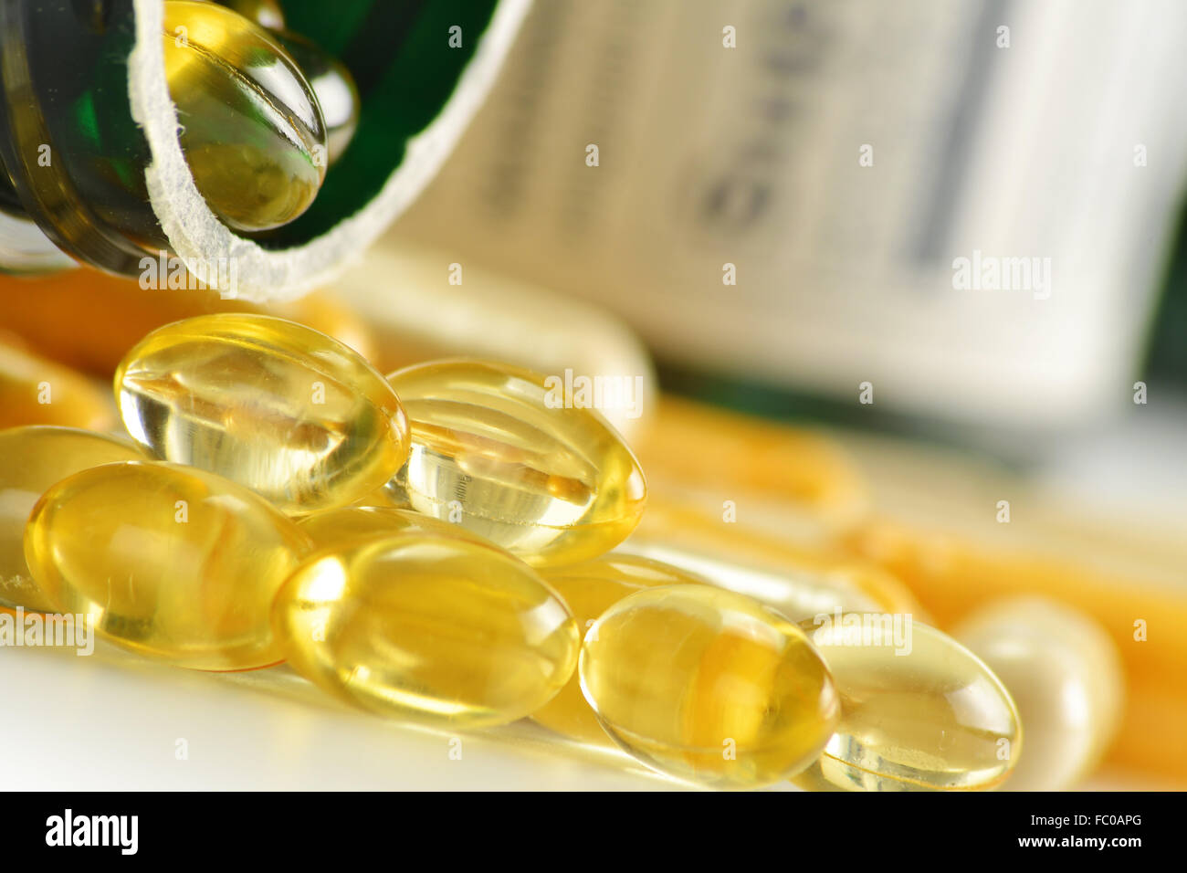 Composition with dietary supplement capsules and containers. Variety of