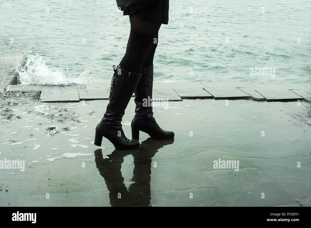 Wet look boots hi-res stock photography and images - Alamy