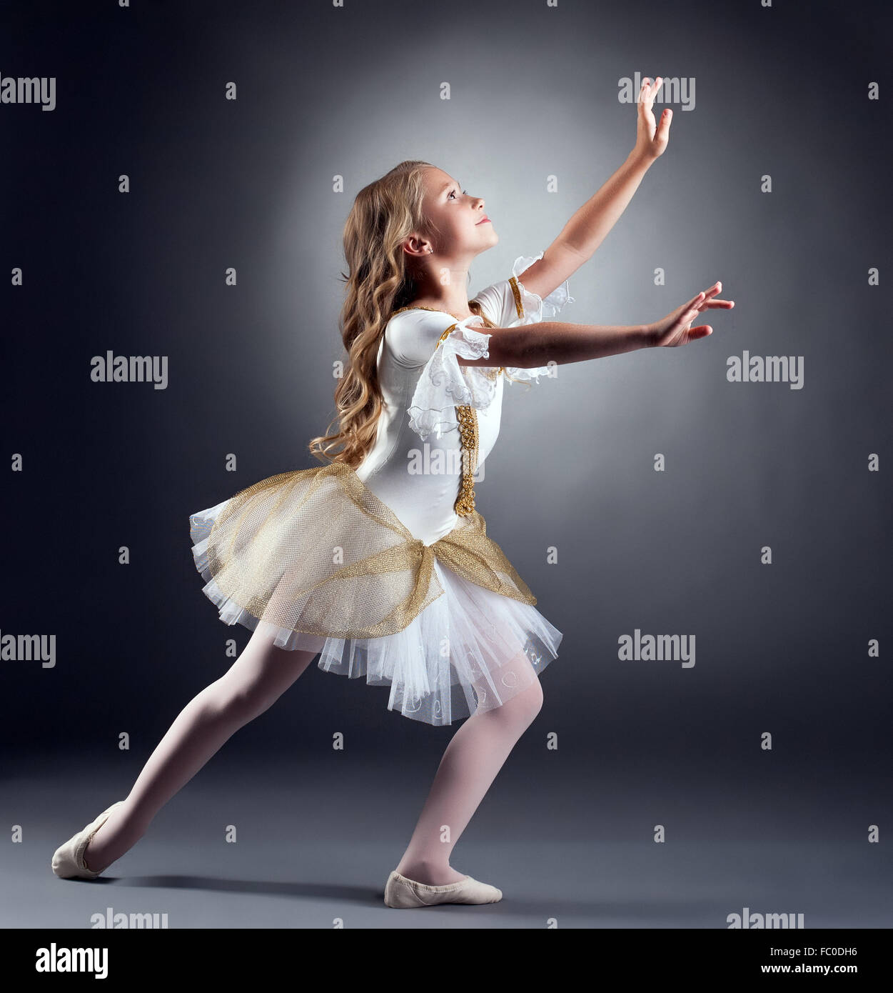 Lovely little ballerina dancing at camera Stock Photo