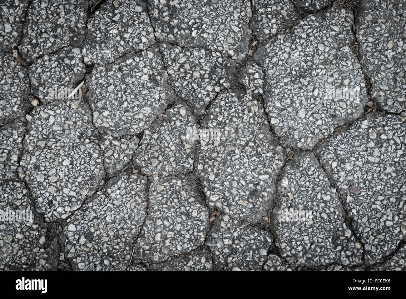 crack surface asphalt road, texture close up Stock Photo