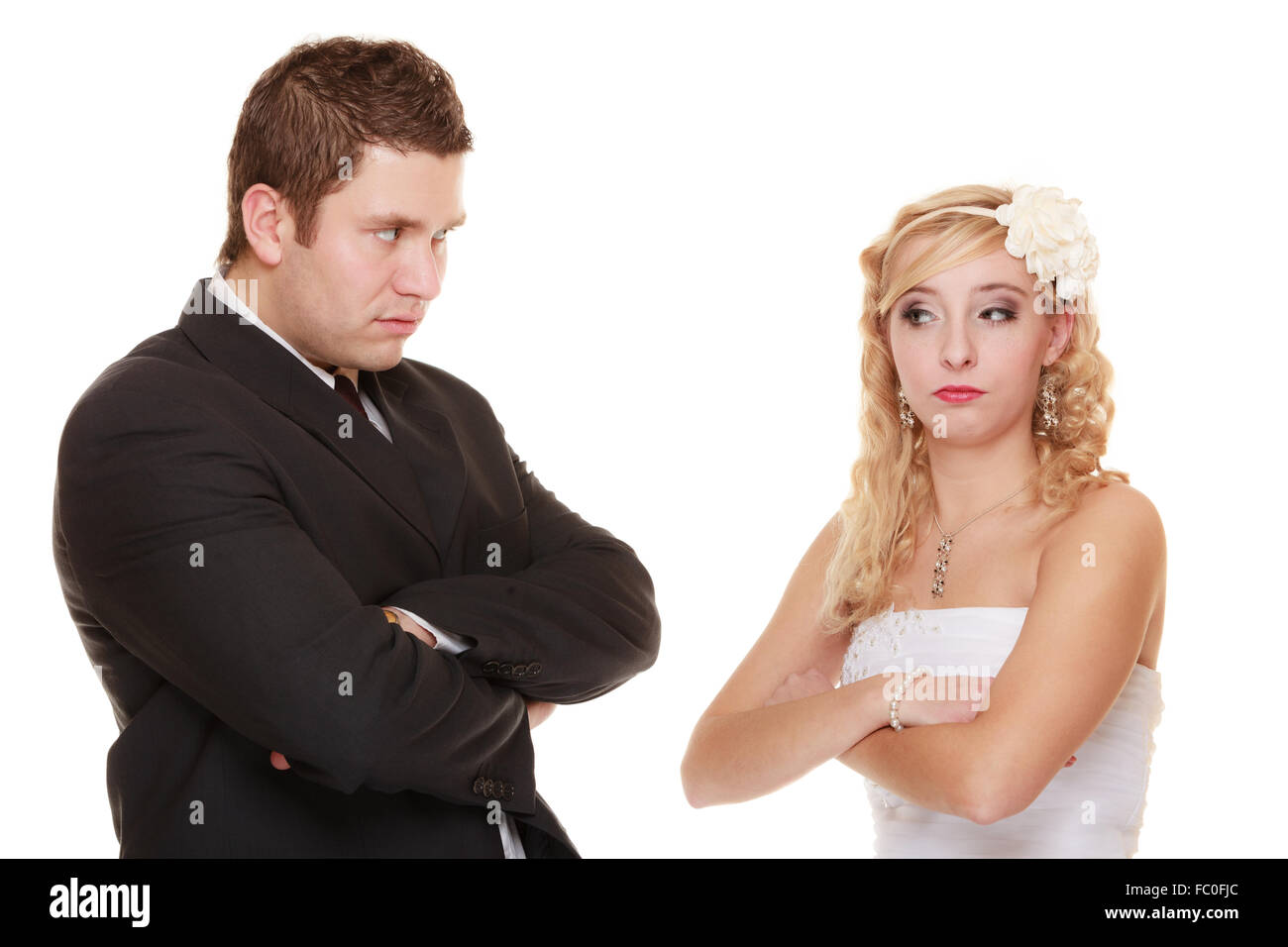 bride and groom looking at each other offended Stock Photo