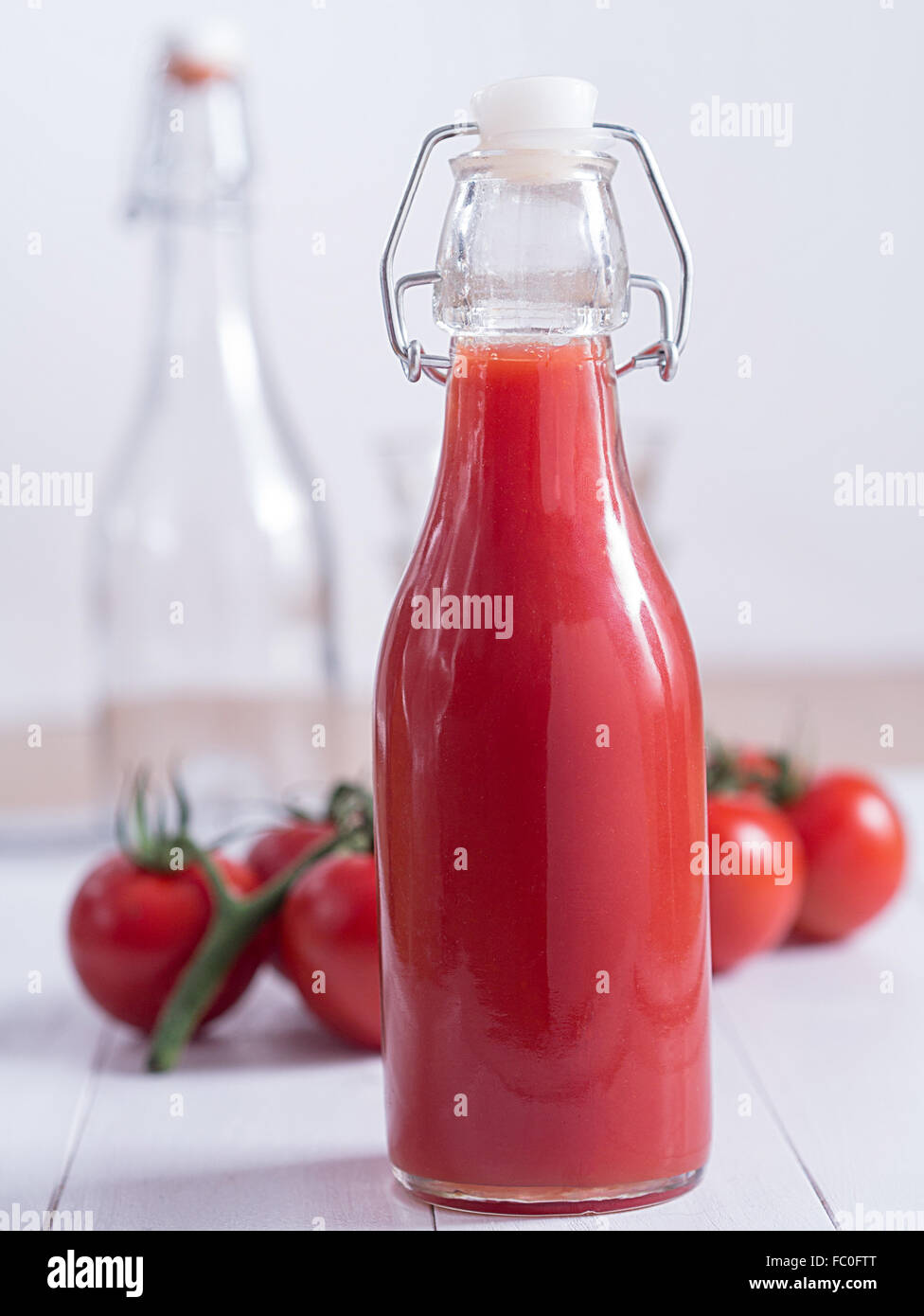 Tomato juice in a bottle Stock Photo Alamy