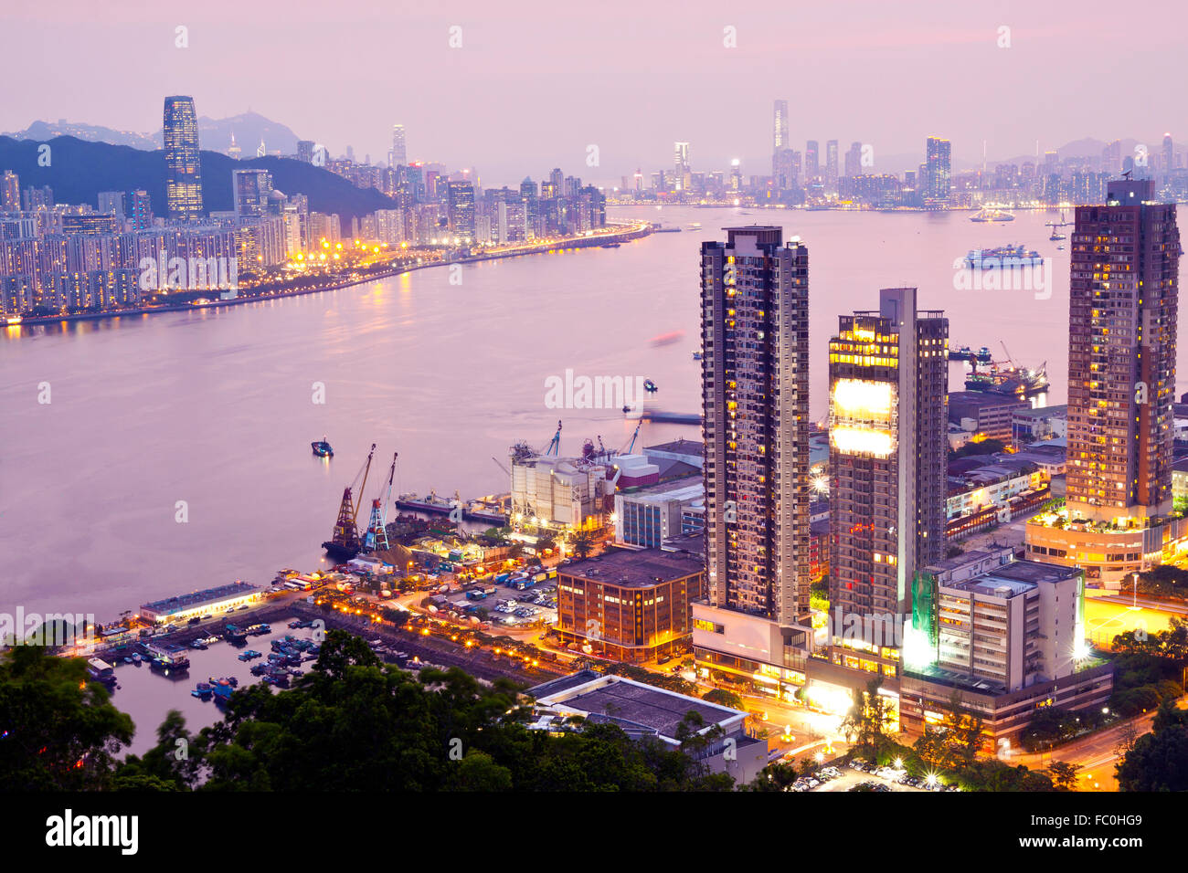Hong Kong city at sunset Stock Photo - Alamy