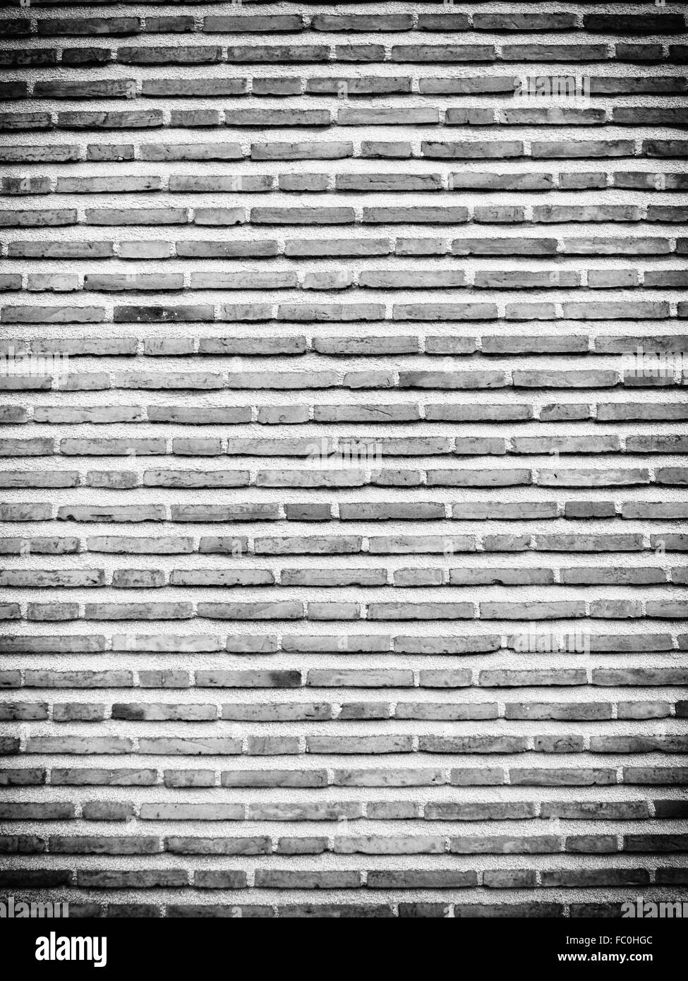 Background of black white brick wall texture Stock Photo - Alamy