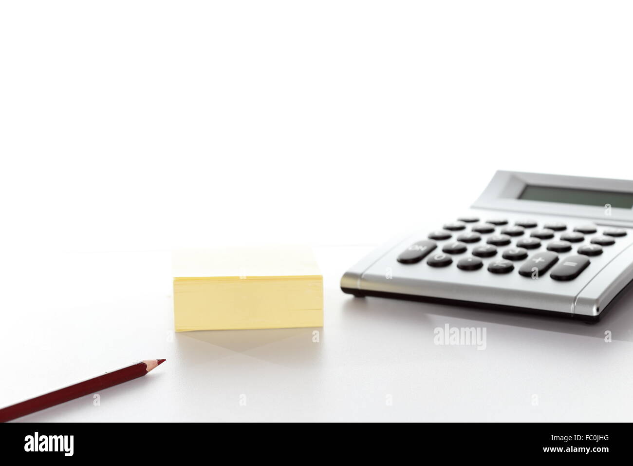 calculator and pen Stock Photo