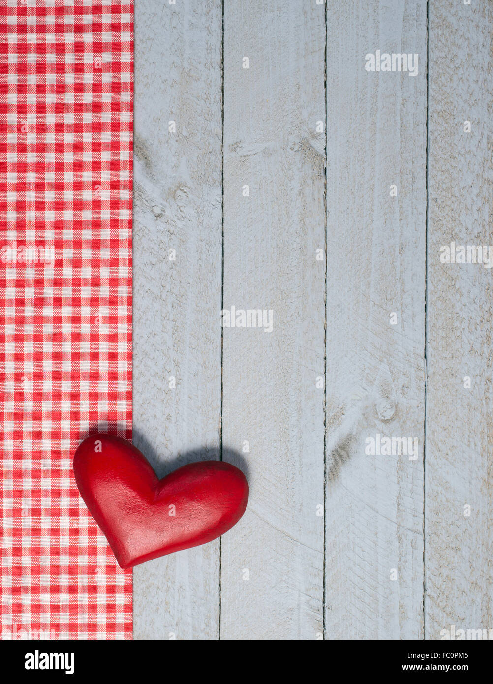 Red Heart on wooden background Stock Photo - Alamy