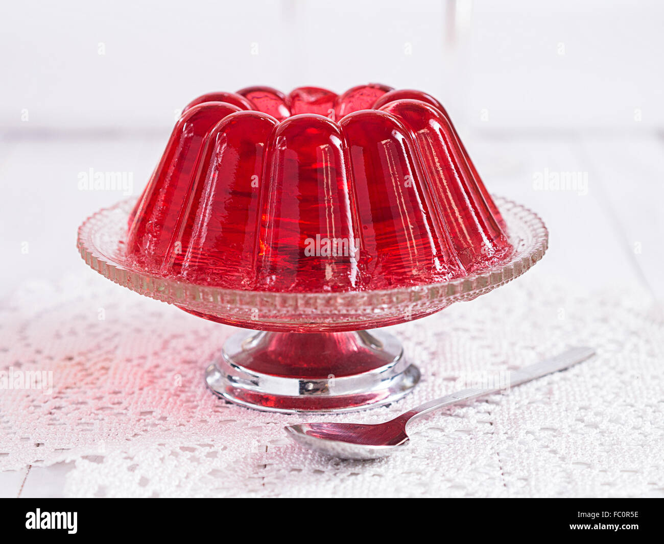 Red jello on a plate Stock Photo Alamy
