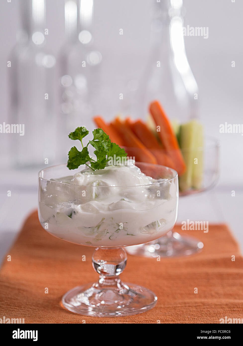 Curd for dipping with carrots and cucumbe Stock Photo