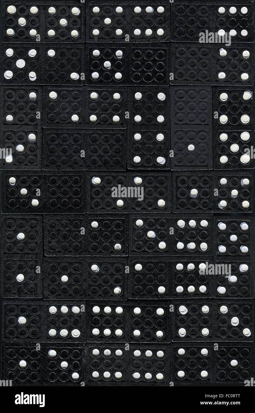 black wooden domino stones with white points Stock Photo