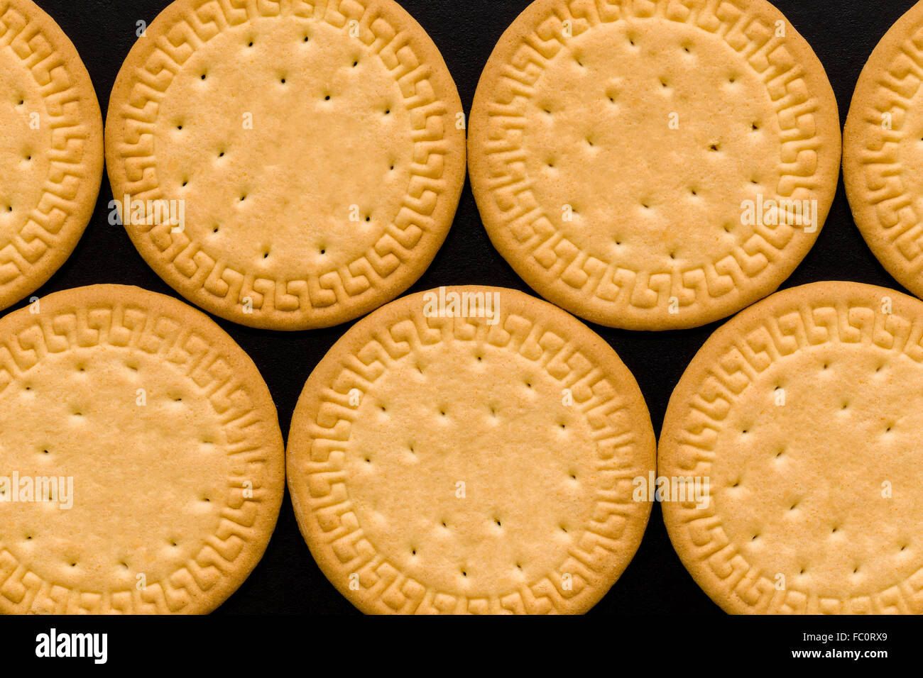 Overhead shot of biscuits put together as background. Stock Photo