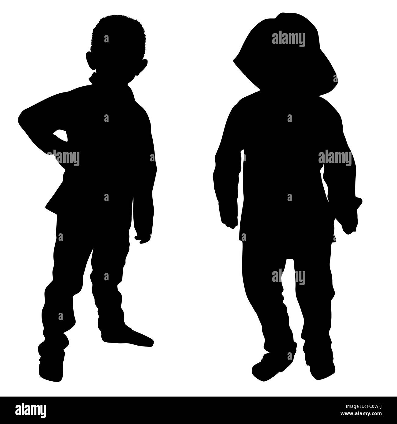 Silhouettes of two little boys Stock Photo