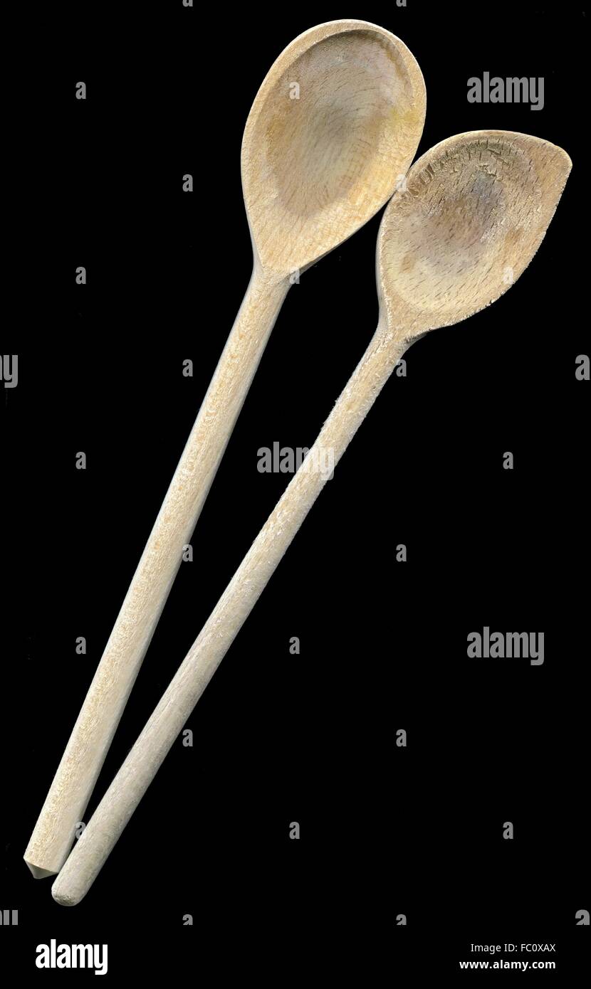 two used wooden cooking spoons Stock Photo