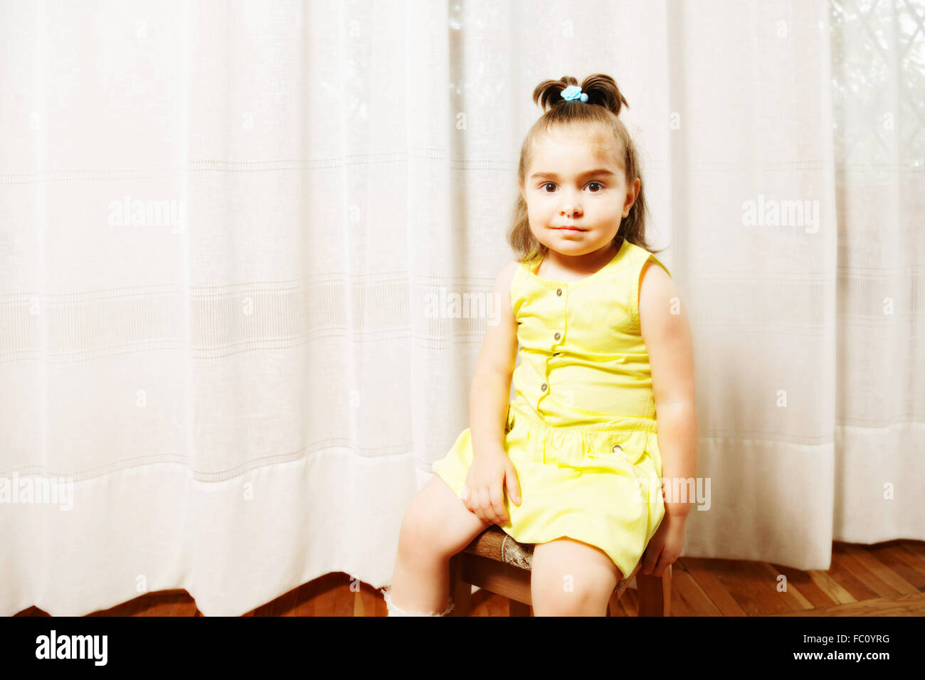 Little girl on stool hi res stock photography and images Alamy