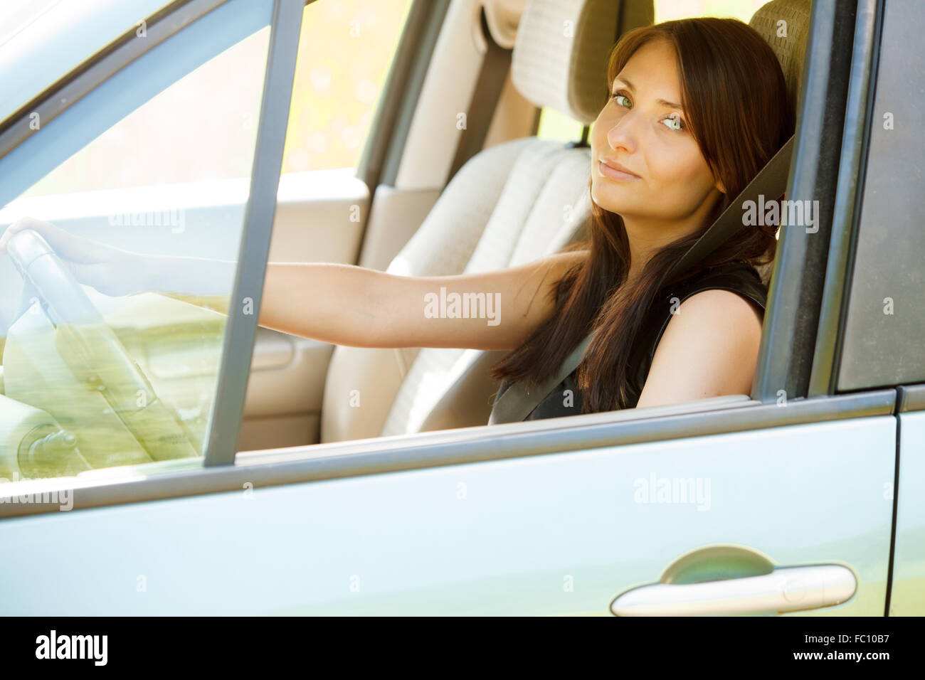 Hands steering wheel woman hi-res stock photography and images - Alamy