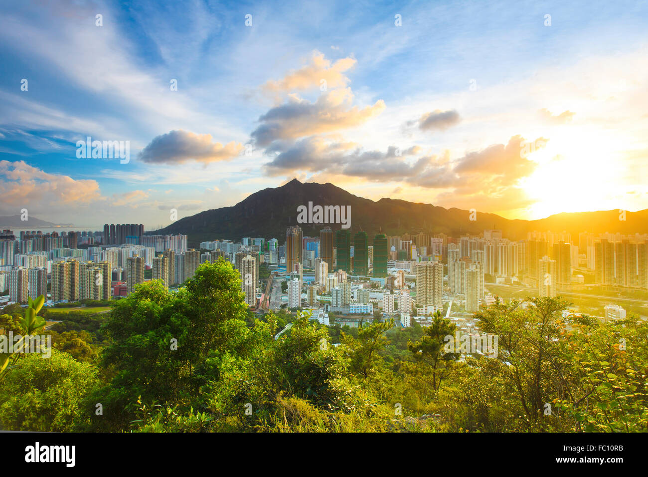 Sunset cityscape in Hong Kong Stock Photo - Alamy