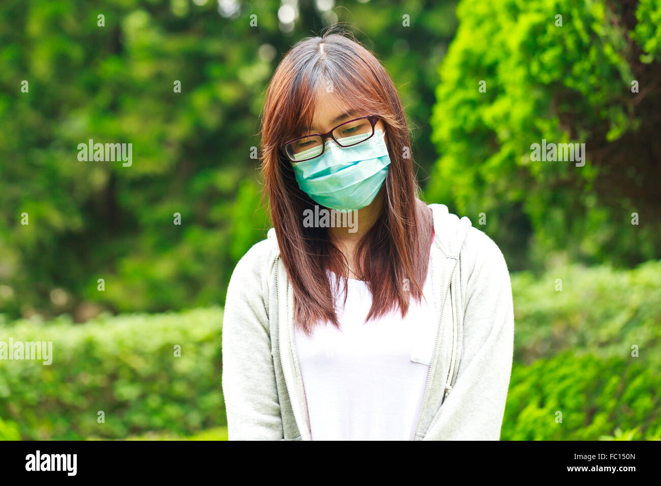 Oriental girl wearing mask hi-res stock photography and images - Alamy