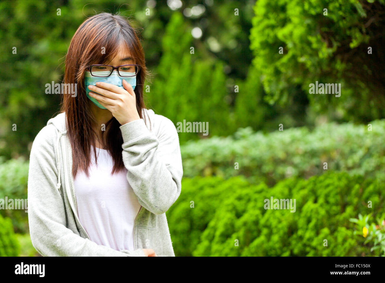 Woman wearing mask Stock Photo Alamy