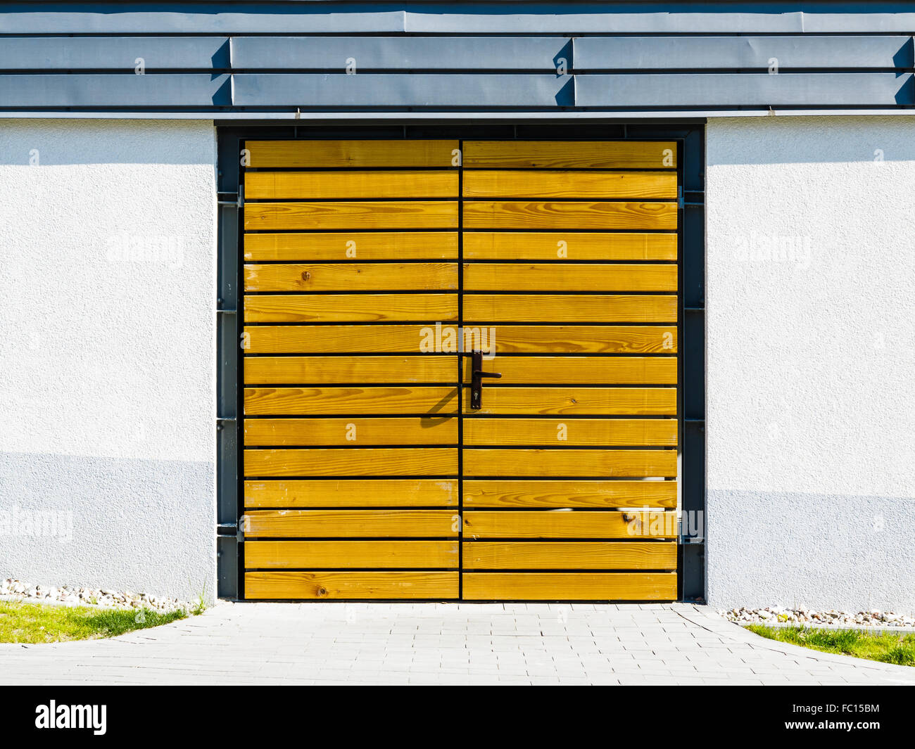 Yellow wooden door outside Stock Photo Alamy