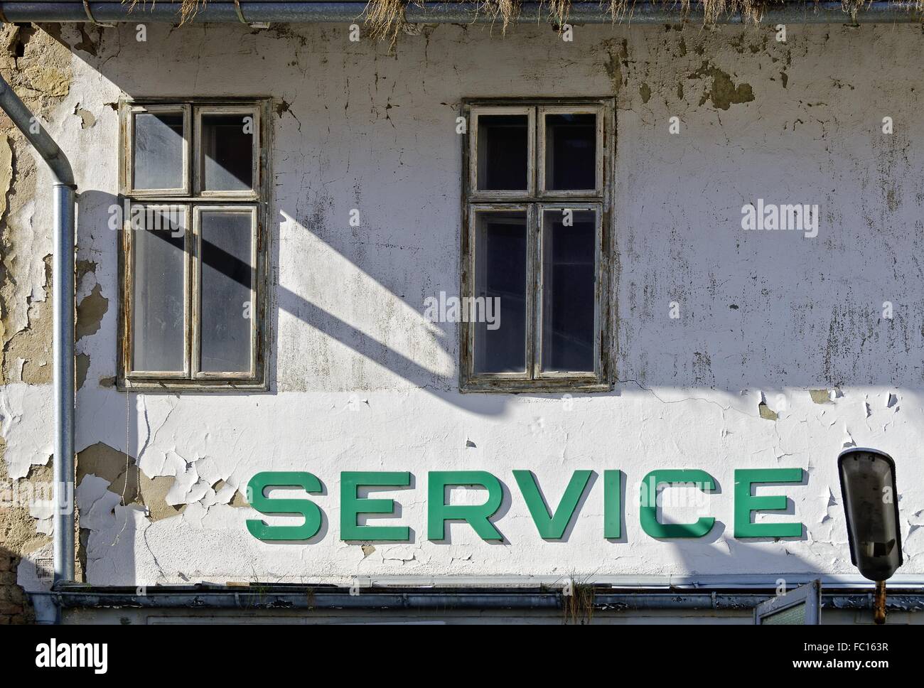 former car service station labeled Service Stock Photo