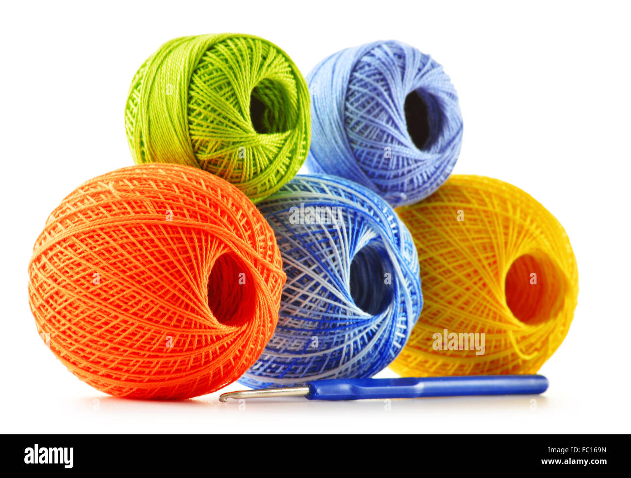 Colorful yarn for crocheting and hook isolated on white background ...