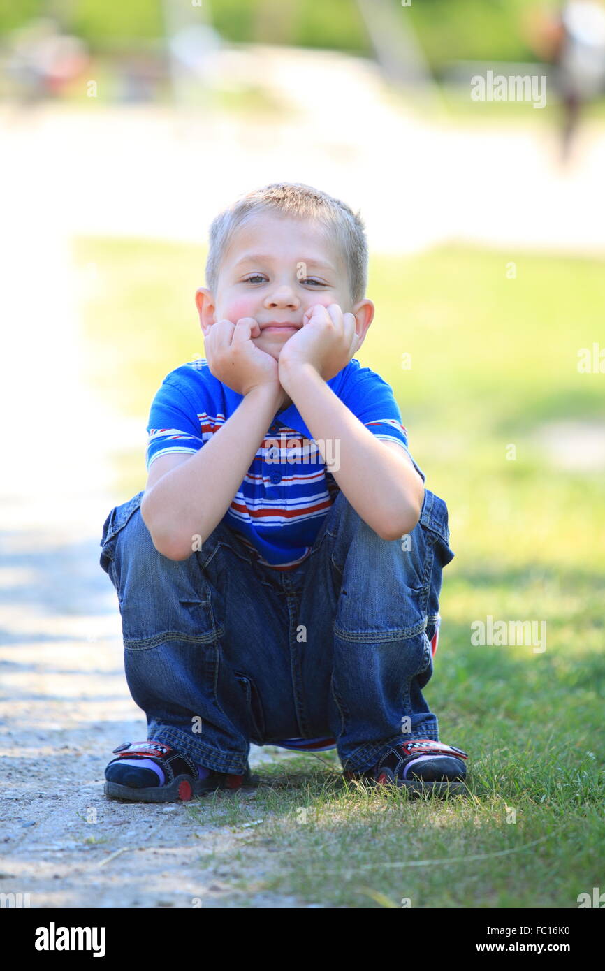 Boy in park hi-res stock photography and images - Alamy