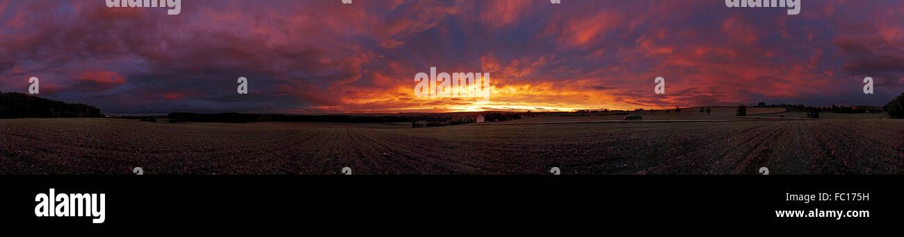 Landscape with Clouds at Sunset Stock Photo - Alamy