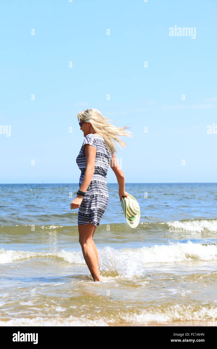 Mature woman summer beach hi-res stock photography and images - Alamy