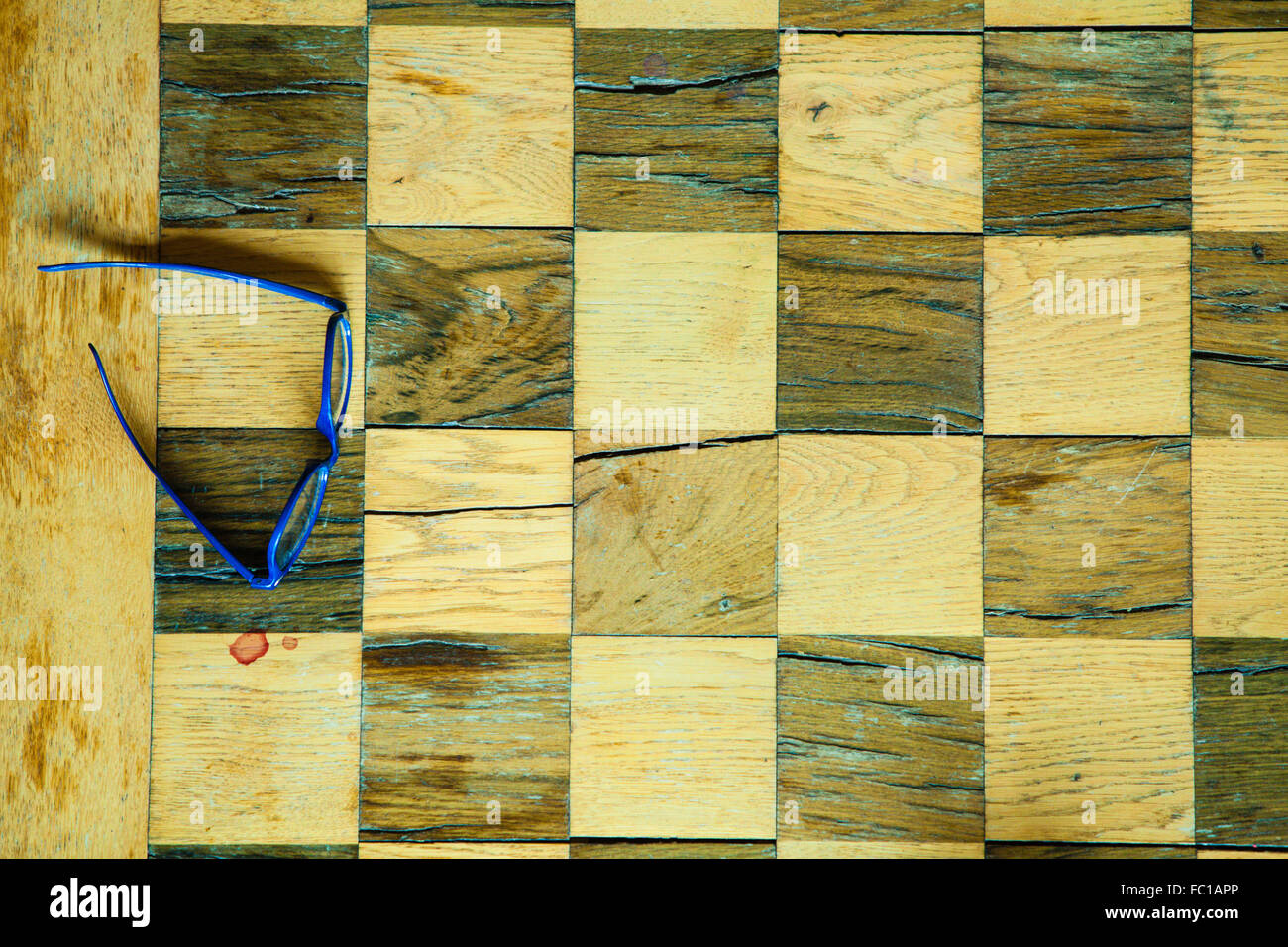 Part of chess old wooden table and glasses Stock Photo
