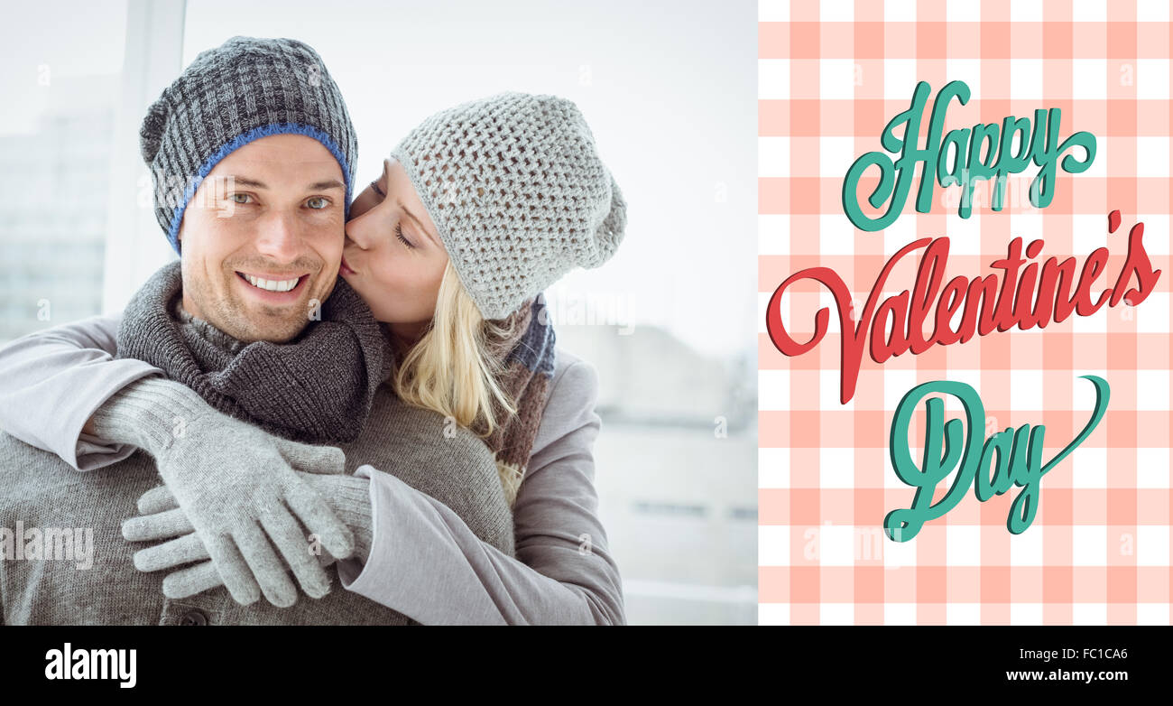 Composite image of cute couple in warm clothing hugging man smiling at ...
