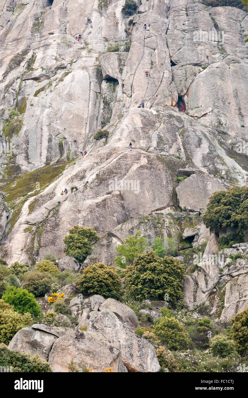 Climbers at Pico de la Miel (Honey Peak), in Sierra de la Cabrera, Guadarrama Mountains, Madrid, Spain Stock Photo