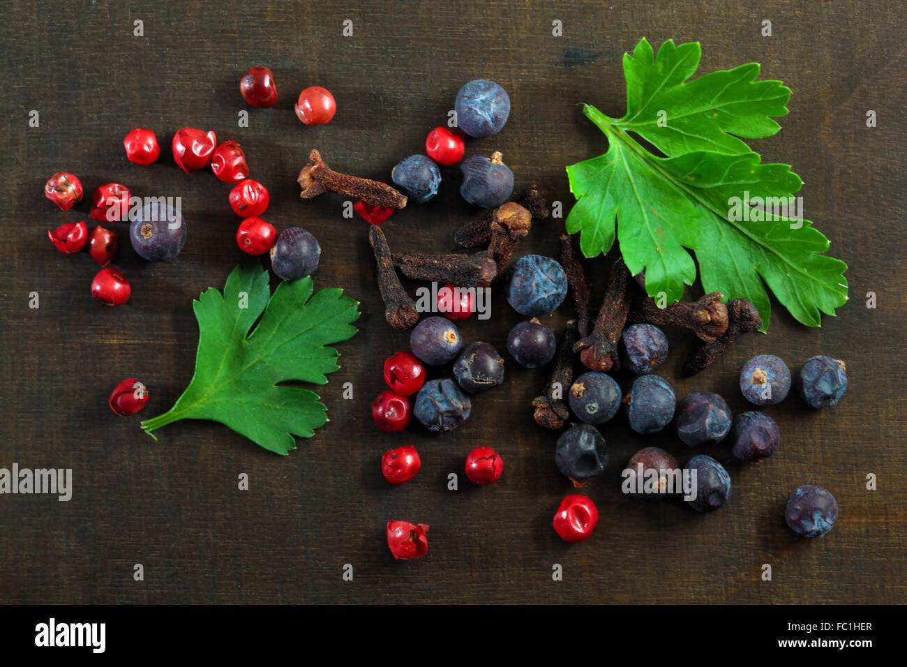 Red Pepper and Juniper Berries Stock Photo