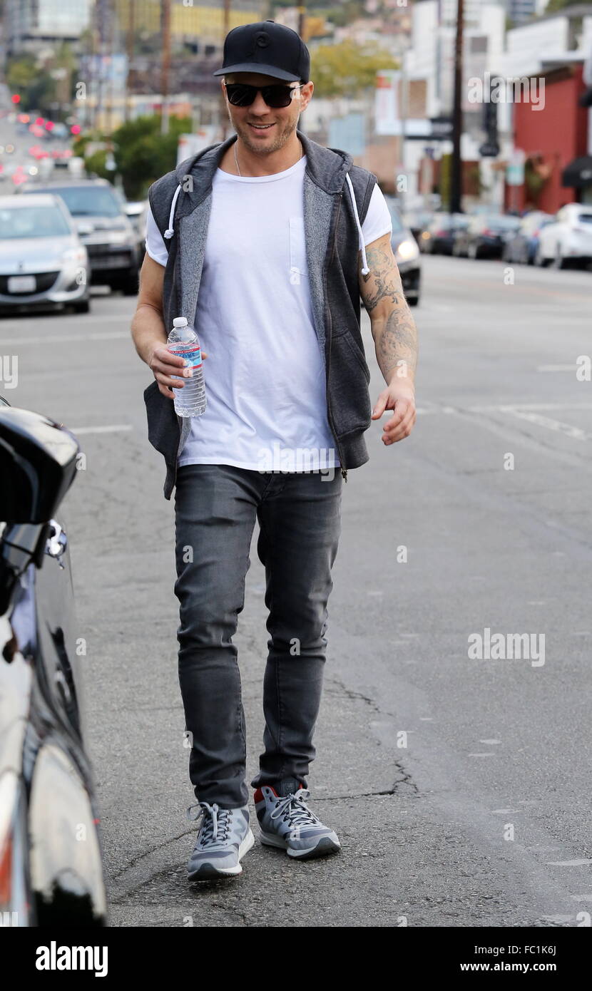 Ryan Phillippe shows of his sleeved tattoos as he heads back to his car after a business meeting in West Hollywood  Featuring: Ryan Phillippe Where: Los Angeles, California, United States When: 19 Dec 2015 Stock Photo