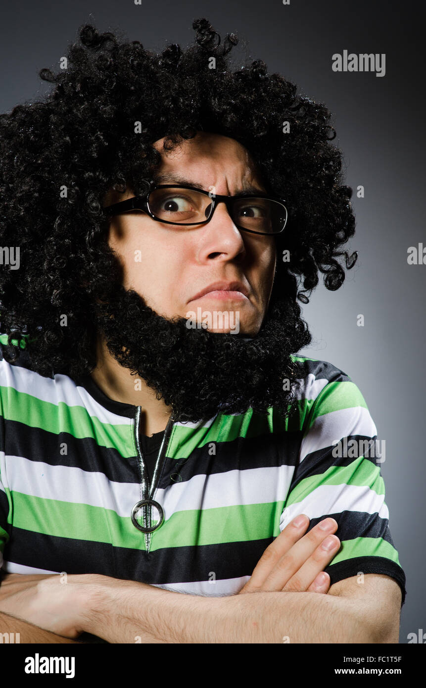Funny man with afro hairstyle isolated on white Stock Photo