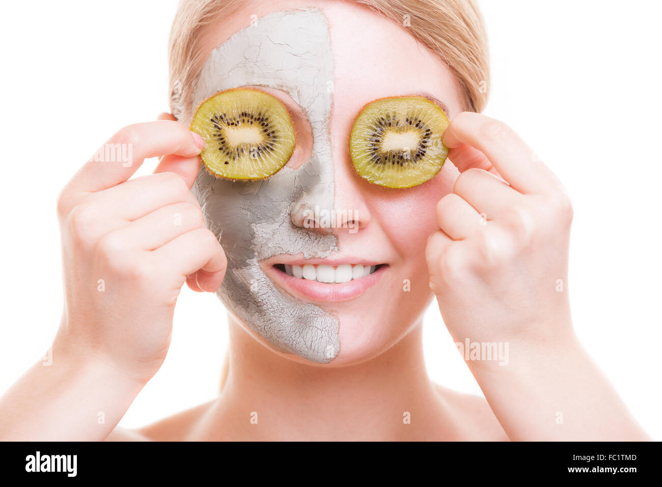 Skin care. Woman applying clay mask on face. Spa Stock Photo Alamy