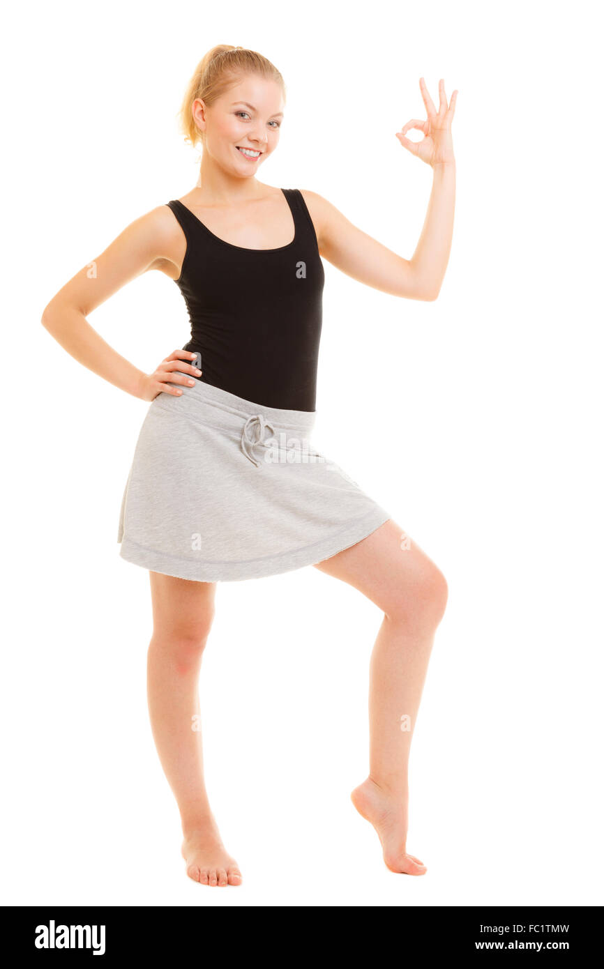 Fitness sporty girl showing ok okay hand sign gesture Stock Photo