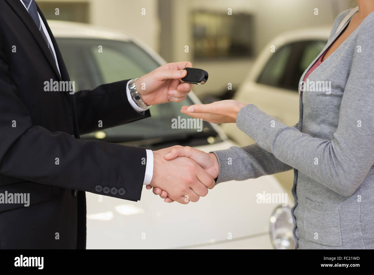 Businessman giving handshake customer hi-res stock photography and ...
