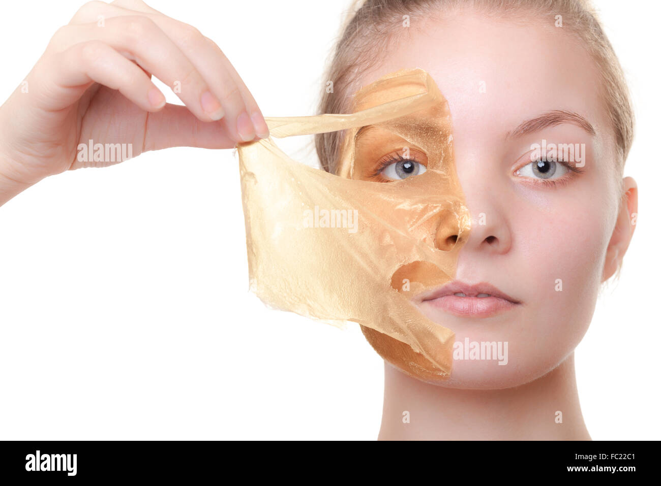 Girl woman in facial peel off mask. Skin care. Stock Photo
