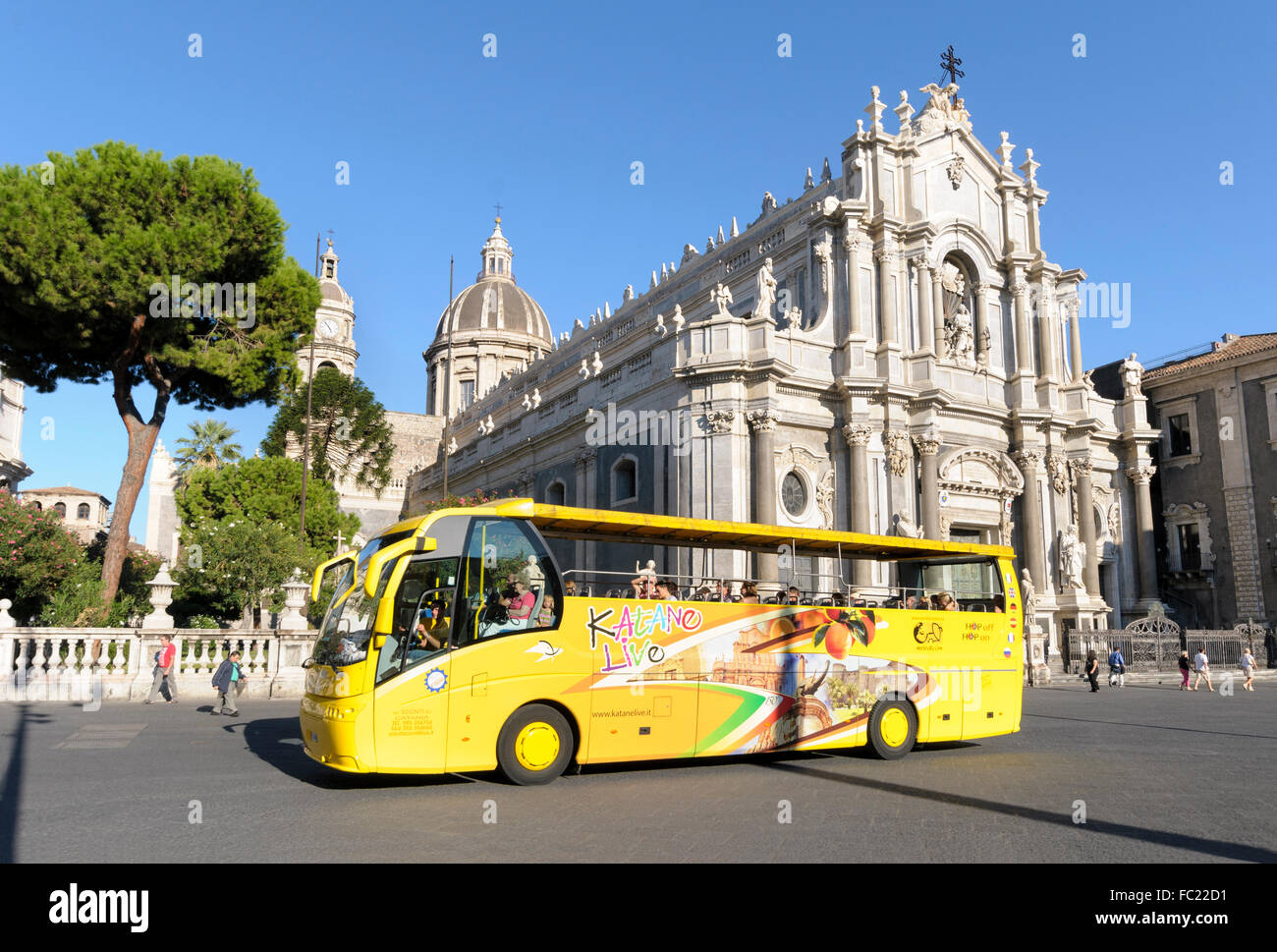 Italy, Sicily, Catania. Katane Live tour bus outside the Cathedral of Saint Agatha. Stock Photo
