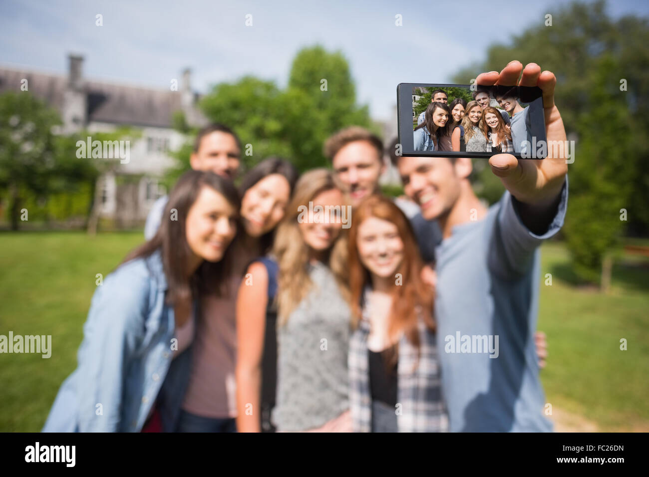 Happy students taking a selfie outside on campus Stock Photo - Alamy
